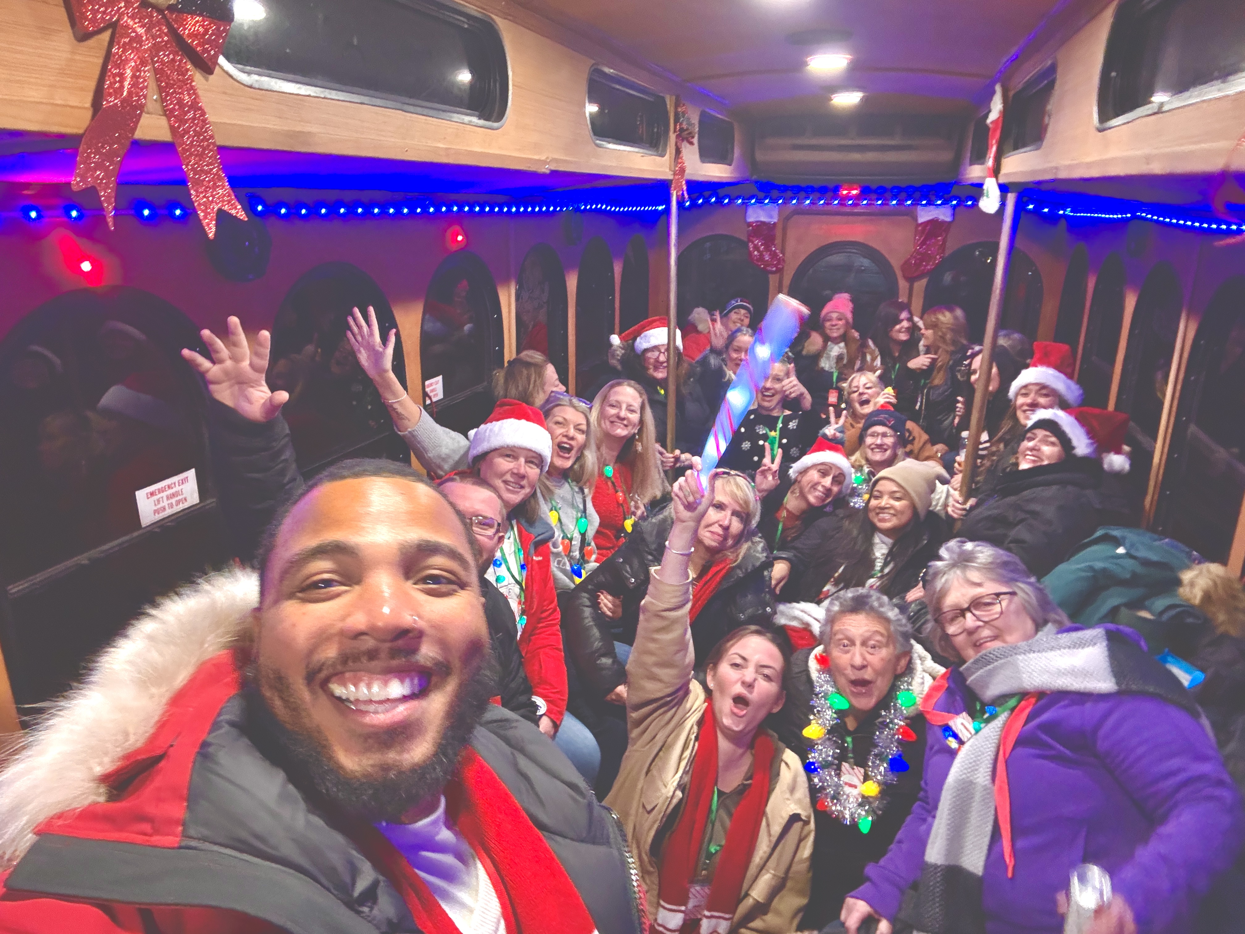 Bryon Lewis-Cummings with a holiday trolley group