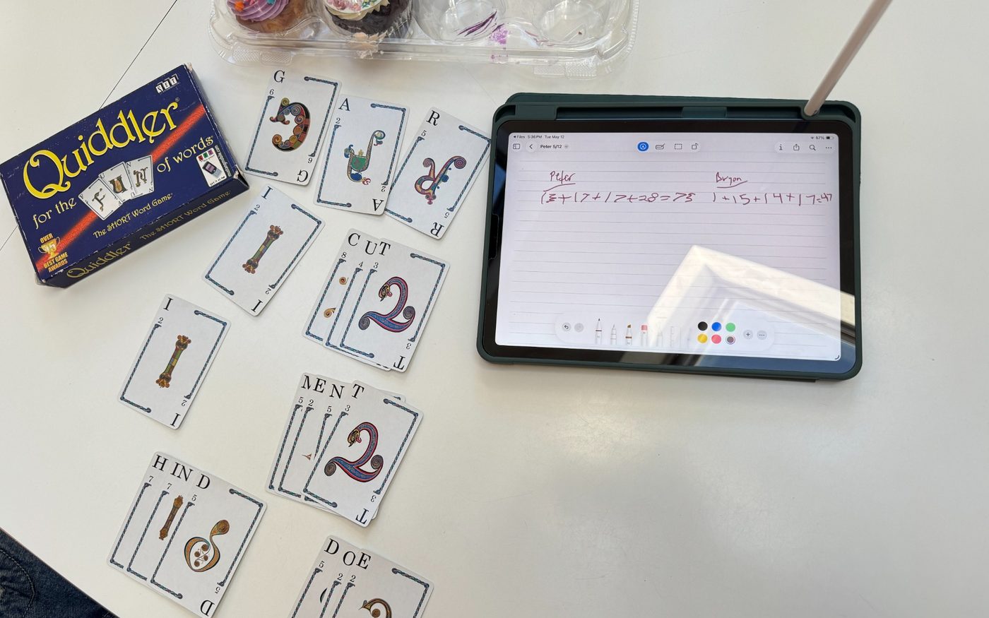 Vocabulary card game and iPad used during tutoring